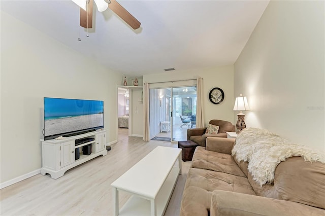 living room with ceiling fan and light wood-type flooring