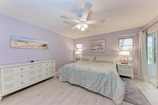 bedroom with light hardwood / wood-style floors and ceiling fan