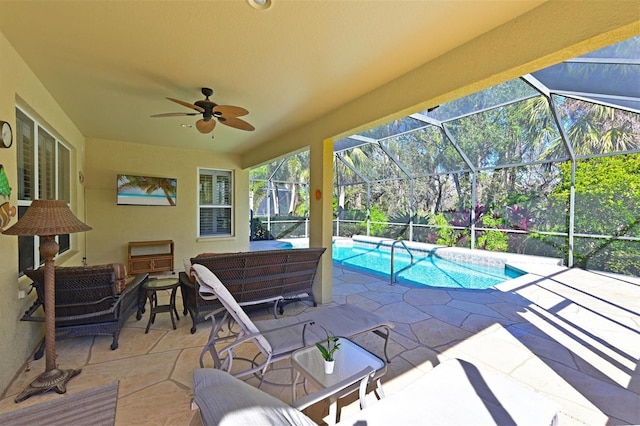 pool featuring a lanai, ceiling fan, an outdoor hangout area, and a patio