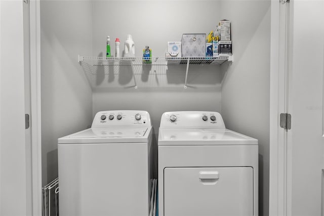 laundry area featuring separate washer and dryer