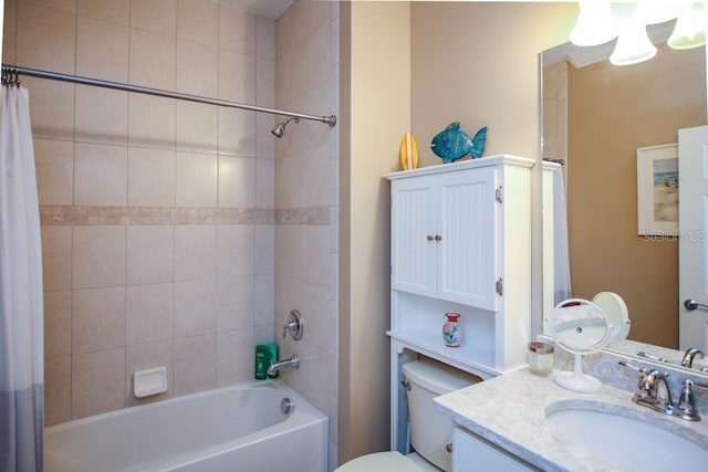 full bathroom featuring vanity, shower / bath combo, and toilet