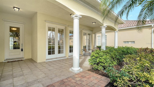 doorway to property featuring french doors