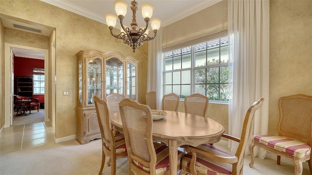 carpeted dining room with an inviting chandelier and ornamental molding