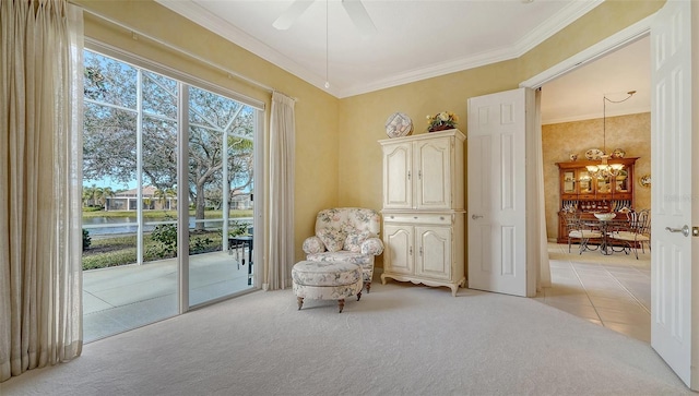 living area featuring crown molding, light colored carpet, and ceiling fan with notable chandelier