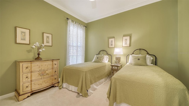 bedroom with ornamental molding, carpet flooring, and ceiling fan