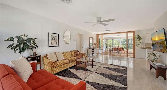 living room featuring ceiling fan