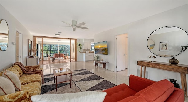 living room featuring ceiling fan