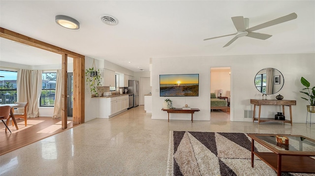 living room with ceiling fan