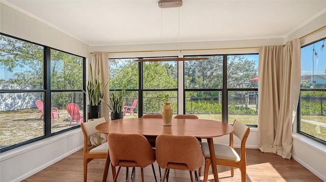 sunroom / solarium featuring plenty of natural light