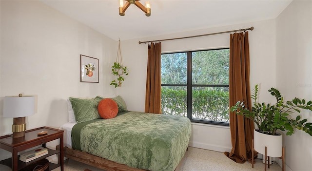 bedroom featuring multiple windows