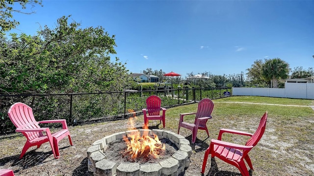 view of patio featuring a fire pit