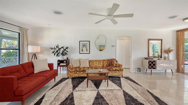 living room with ceiling fan