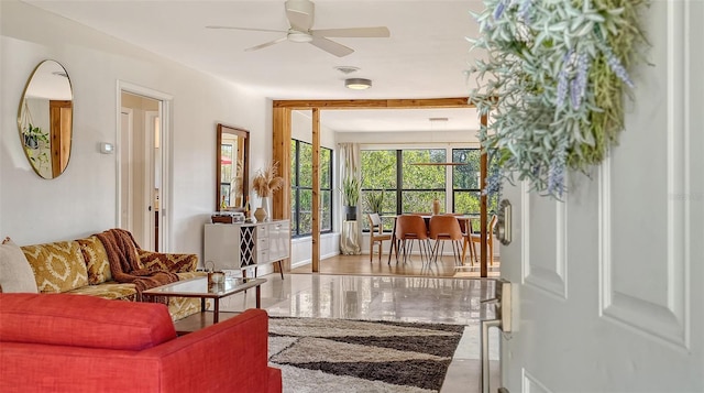 living room with a ceiling fan