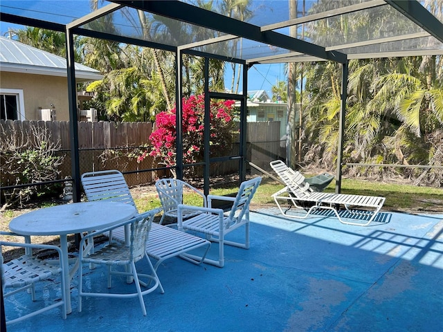 view of patio / terrace featuring fence