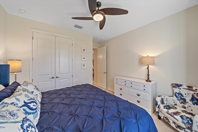 bedroom featuring carpet, ceiling fan, and a closet