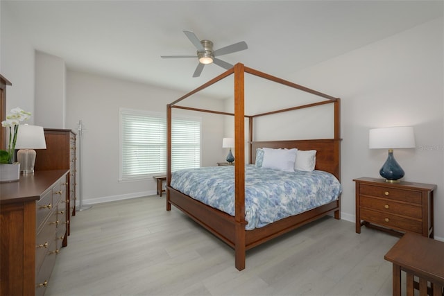 bedroom with ceiling fan and light hardwood / wood-style floors