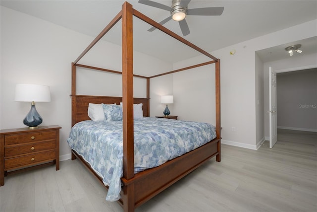 bedroom with light wood-type flooring and ceiling fan