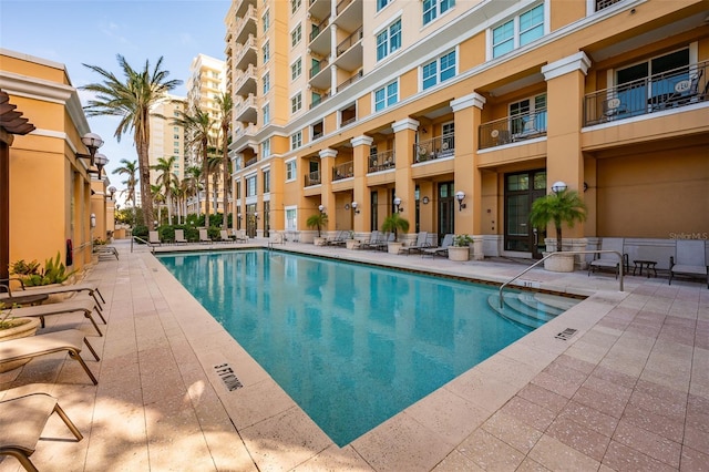 view of pool featuring a patio