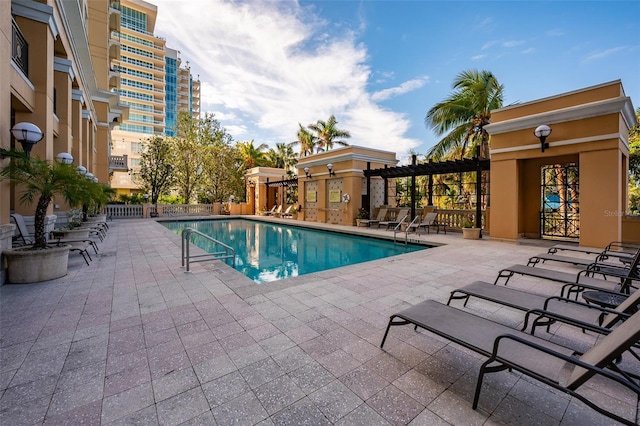 view of swimming pool with a patio