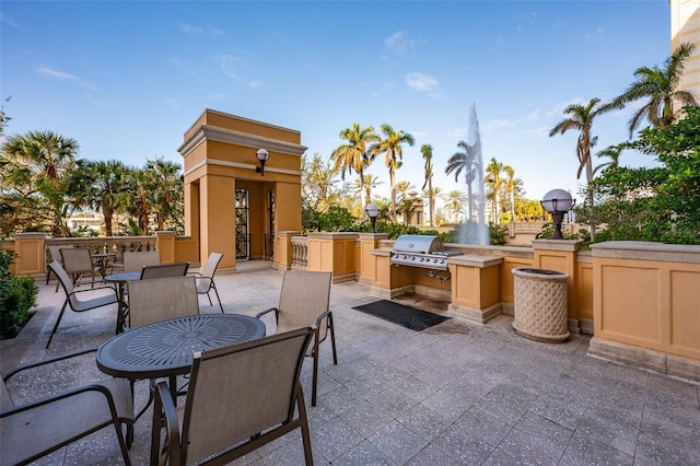 view of patio with exterior kitchen and area for grilling