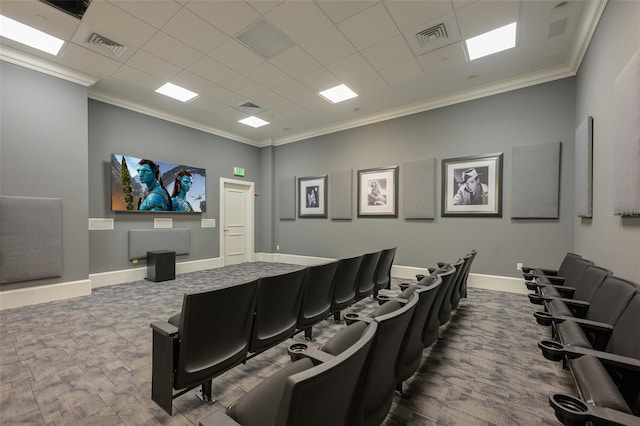 home theater featuring hardwood / wood-style flooring and crown molding