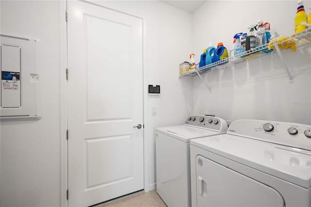 clothes washing area with independent washer and dryer