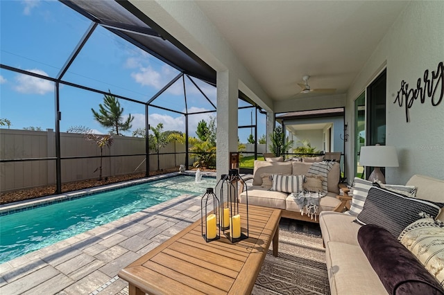 exterior space featuring a fenced in pool, a patio, ceiling fan, fence, and an outdoor living space