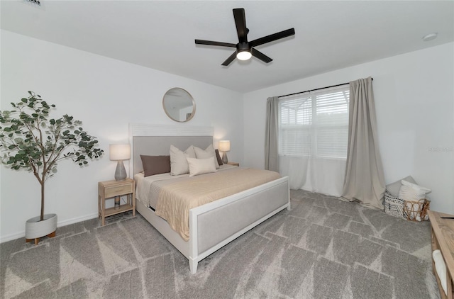 bedroom featuring carpet flooring, a ceiling fan, and baseboards