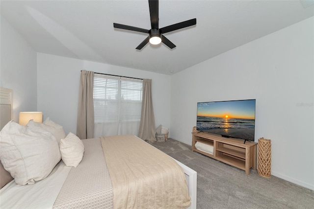 carpeted bedroom with a ceiling fan