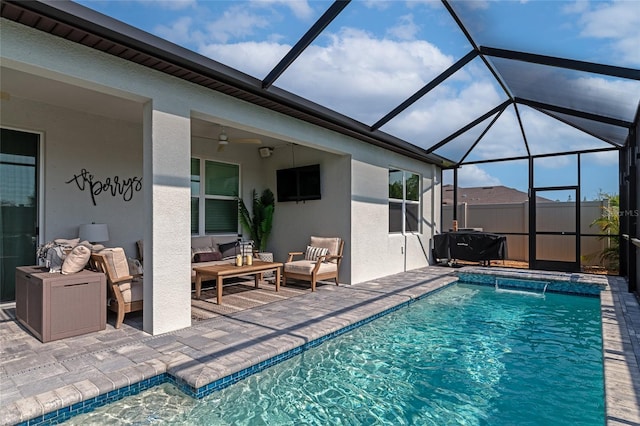 view of pool featuring ceiling fan, a patio, a lanai, an outdoor hangout area, and a fenced in pool