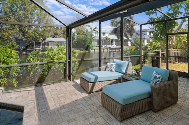 sunroom / solarium featuring a residential view