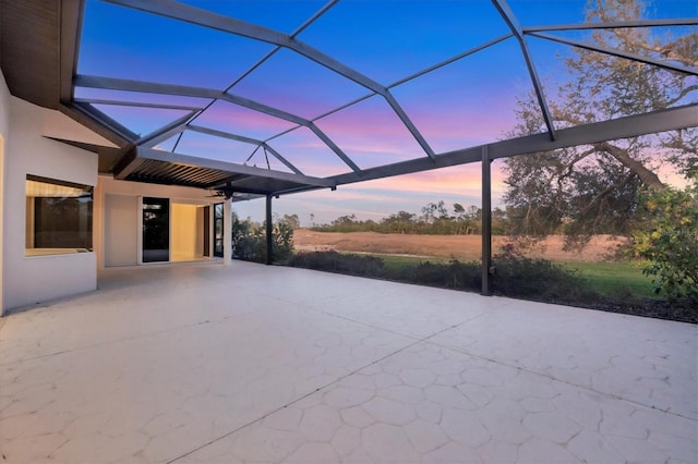 patio terrace at dusk with a lanai