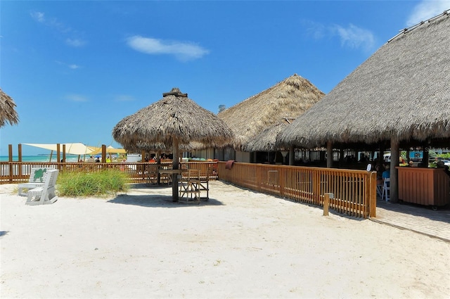 view of community featuring a gazebo and a water view