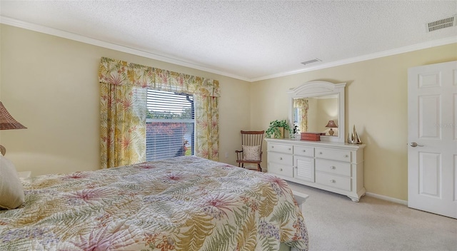 carpeted bedroom with ornamental molding and a textured ceiling