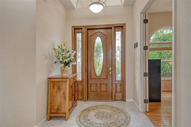 view of tiled foyer entrance