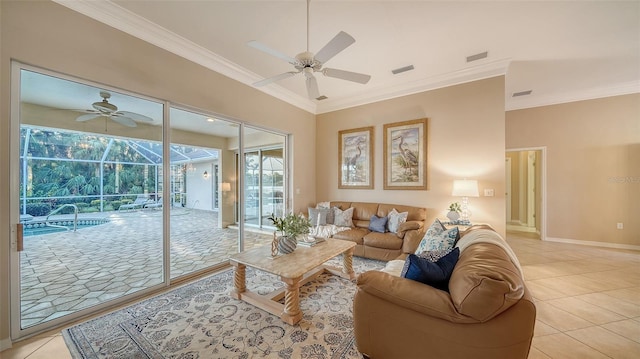 living room featuring light tile patterned floors, ornamental molding, and ceiling fan