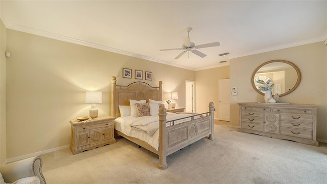 carpeted bedroom with crown molding and ceiling fan