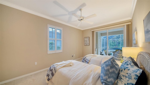 bedroom featuring carpet flooring, ornamental molding, access to exterior, and multiple windows