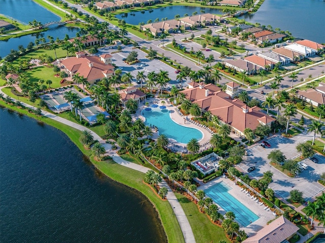 birds eye view of property featuring a water view