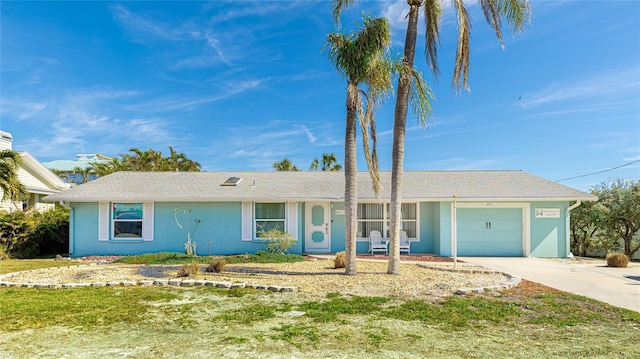 single story home with a garage