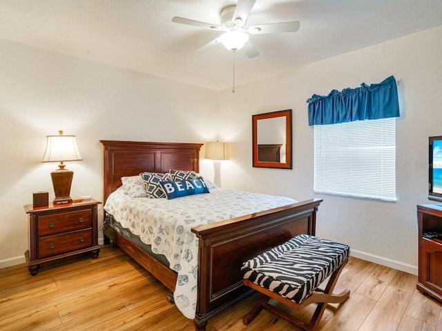 bedroom featuring ceiling fan and light wood-type flooring