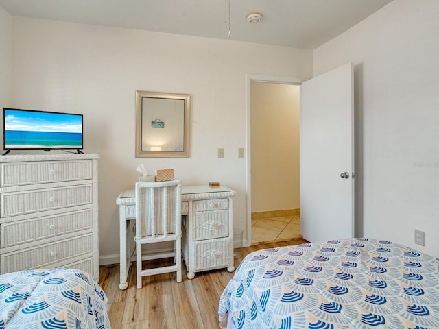 bedroom with light hardwood / wood-style flooring