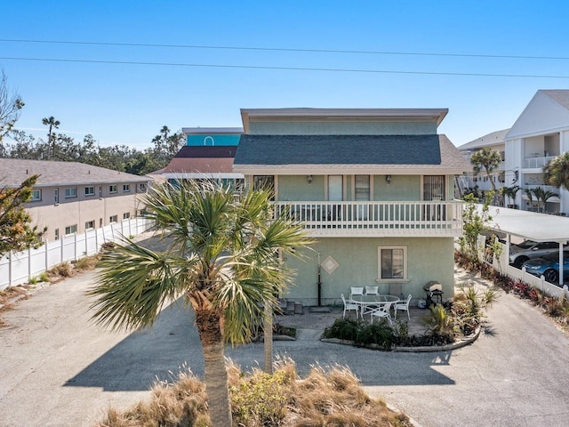 view of front of property featuring a patio