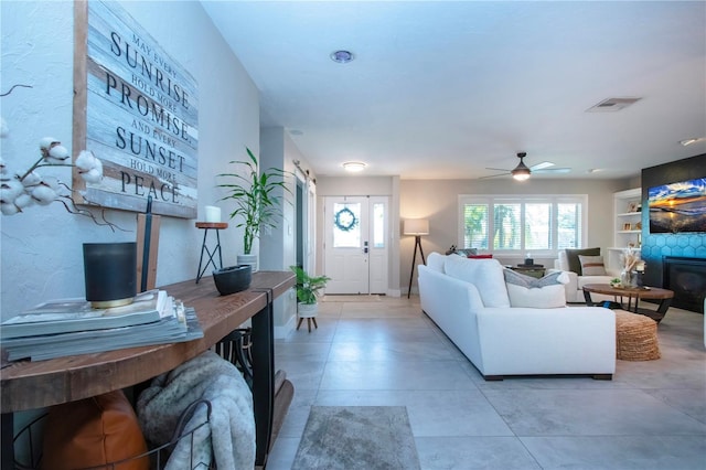 living room with ceiling fan