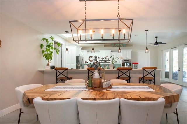 dining room featuring french doors and ceiling fan