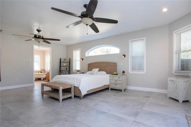 bedroom with multiple windows and ceiling fan