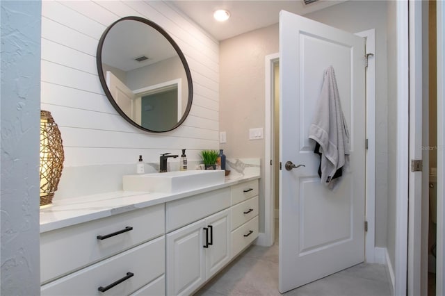 bathroom featuring tile patterned floors and vanity