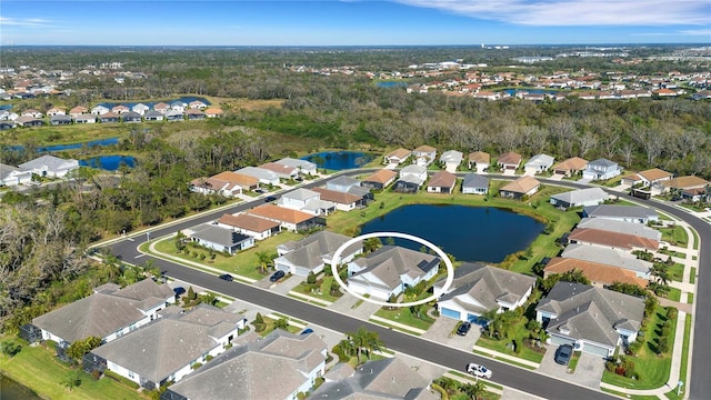 aerial view featuring a residential view and a water view