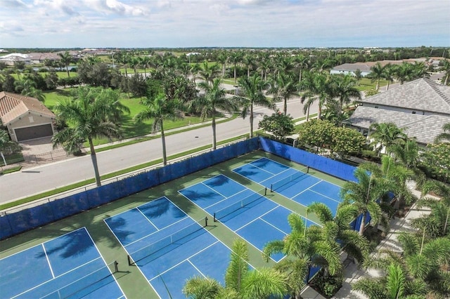 view of sport court with fence