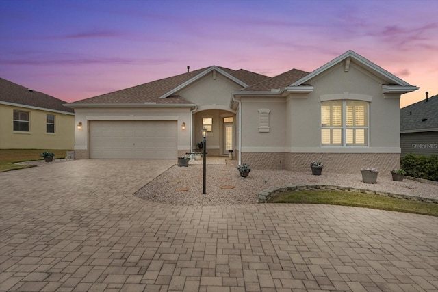 single story home with a garage